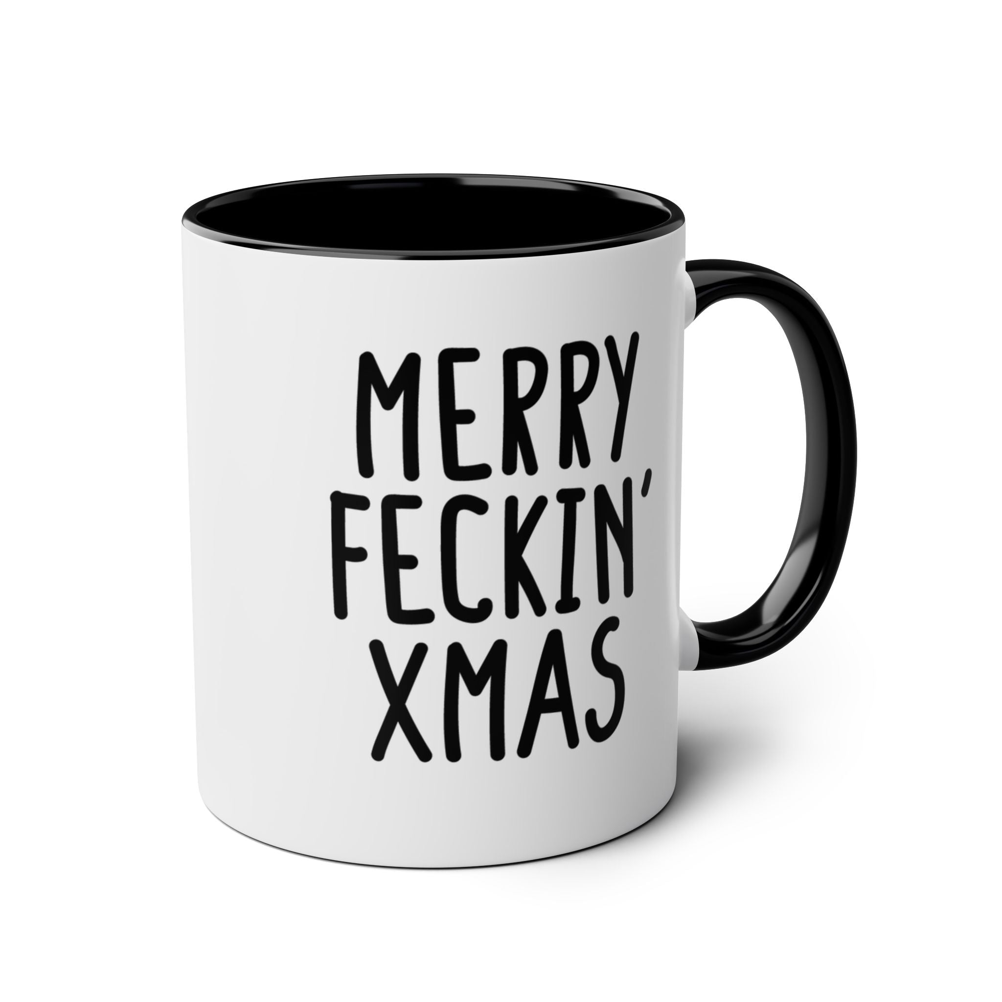 White mug with black interior and handle, featuring the text 'Merry Feckin' XMAS' on a white background.